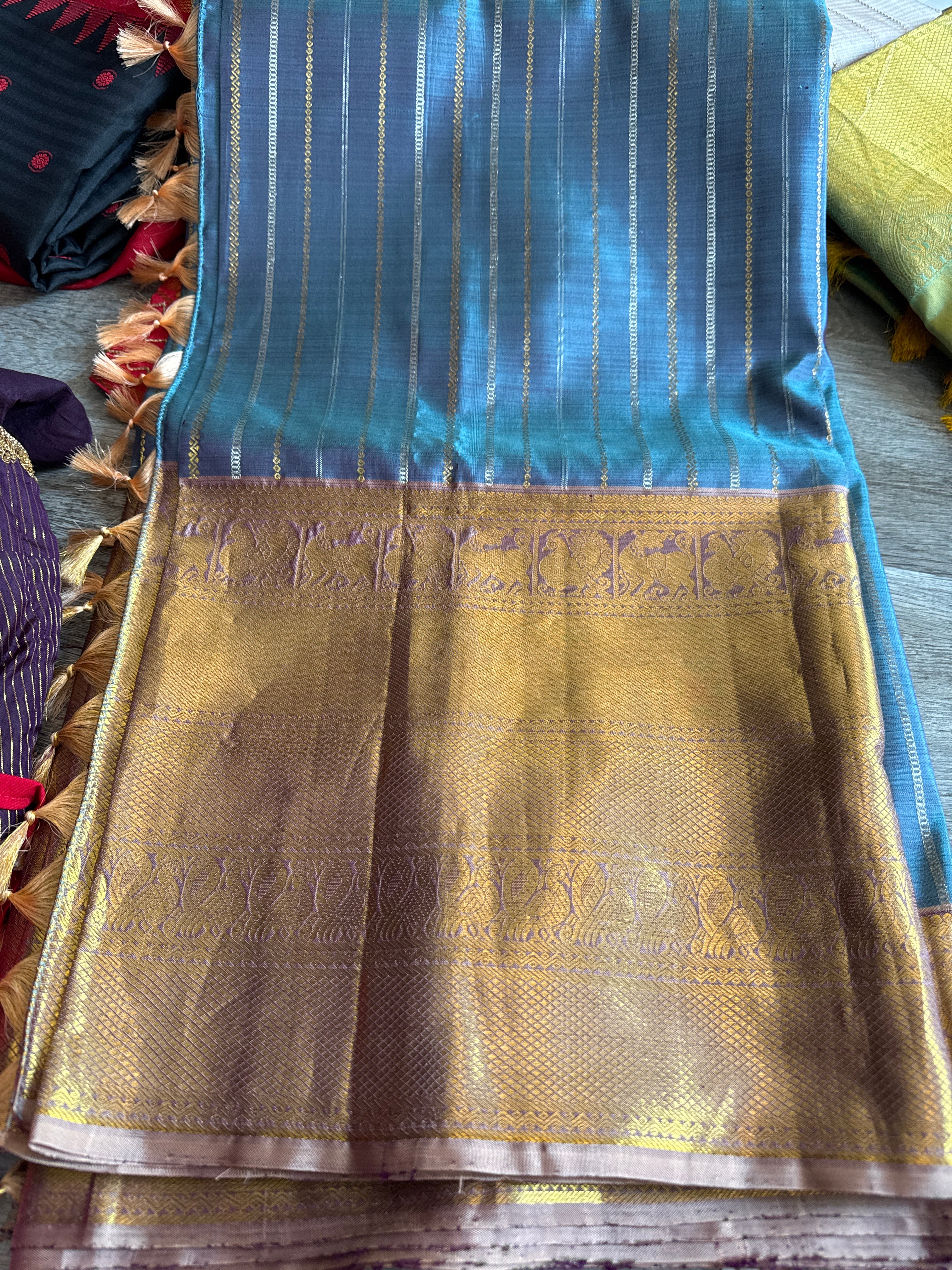 blue kanchi with mauve border
