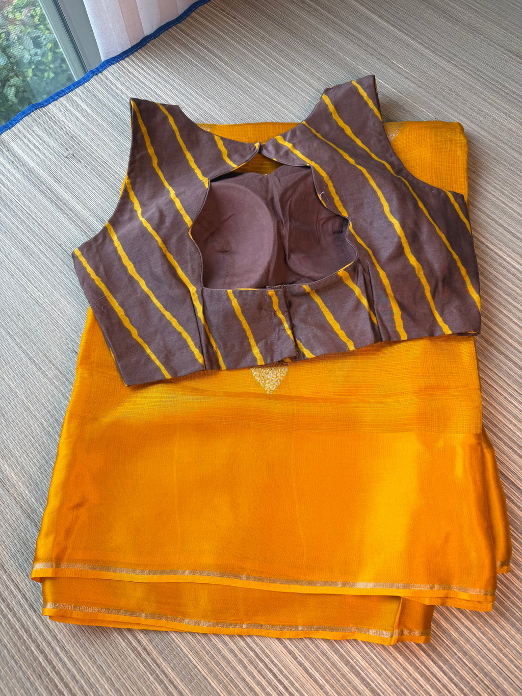 Kota Saree with printed sleeveless Blouse - Yellow/Brown