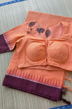 Pink saree with blue lotus embroidery blouse